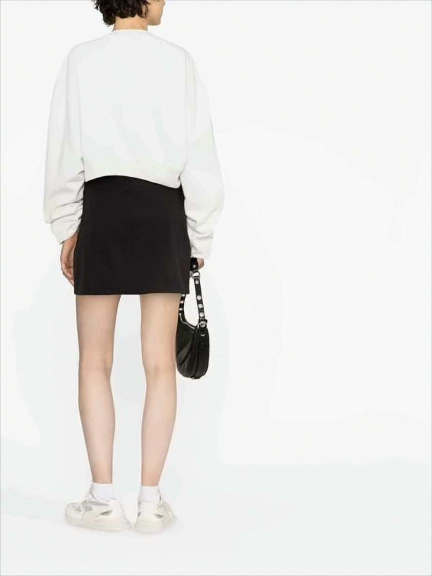Off-White Cropped Long-Sleeve Top With Relaxed Fit And Subtle Logo