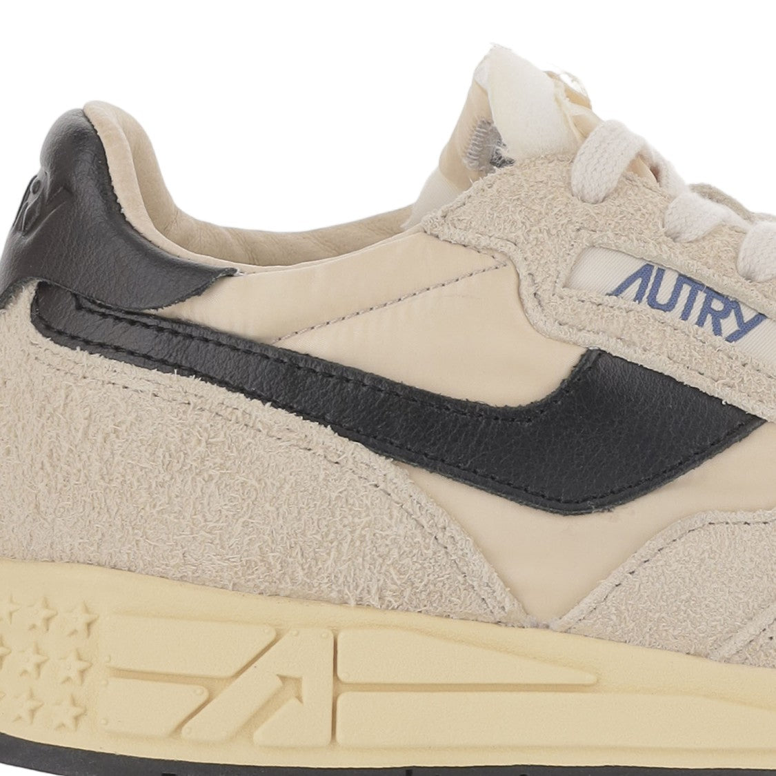 Autry Ivory/Black Leather Running Sneakers