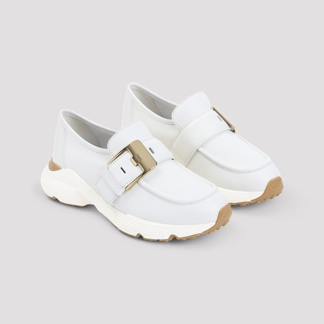 Tod's Chunky White Leather Sneakers With Distinctive Buckle Strap