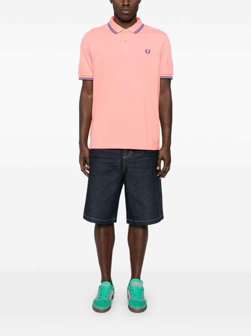 Comme Des Garçons Coral Pink Polo Shirt With Slogan Print