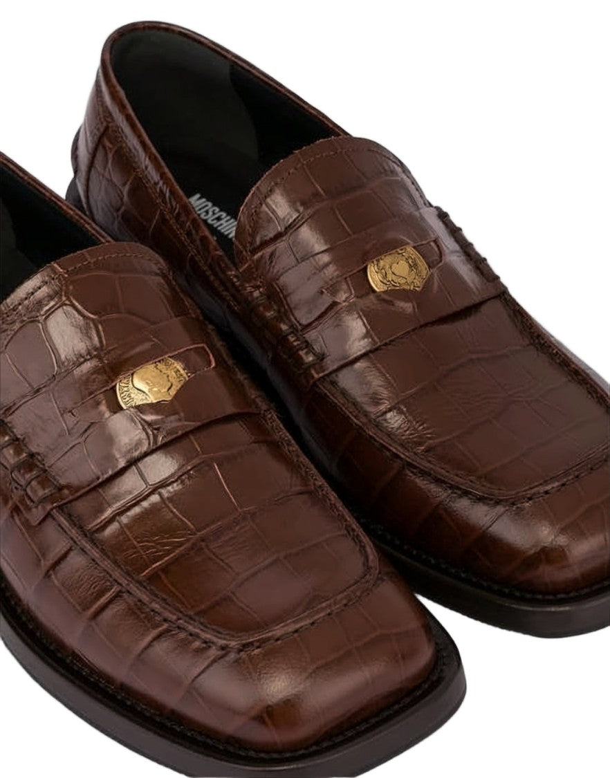 Moschino Crocodile-Embossed Brown Leather Mules With Gold Emblem