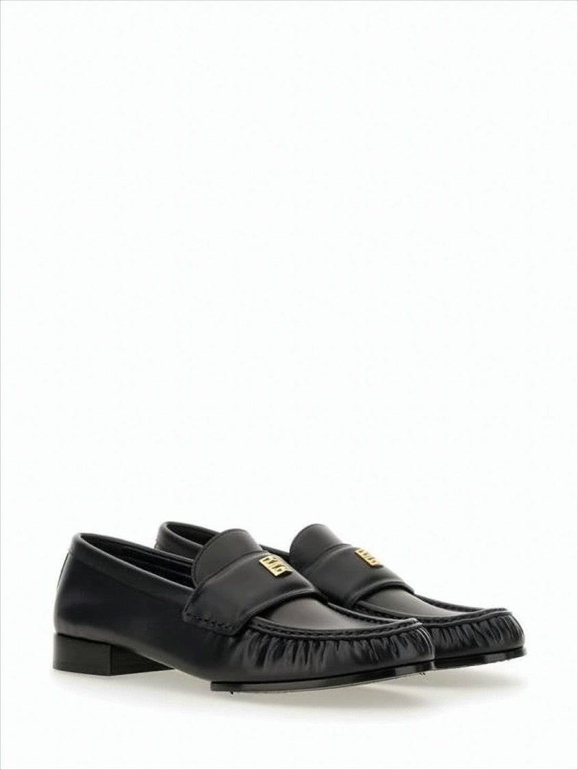 Givenchy Black Lambskin Loafers With Moccasin Toe And Gold Emblem