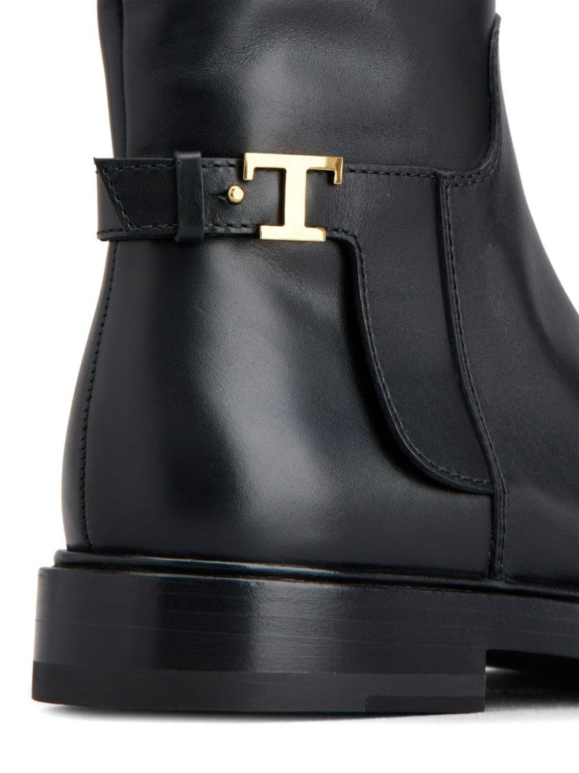 Tod's Minimalist Black Ankle Boots With Gold Accent