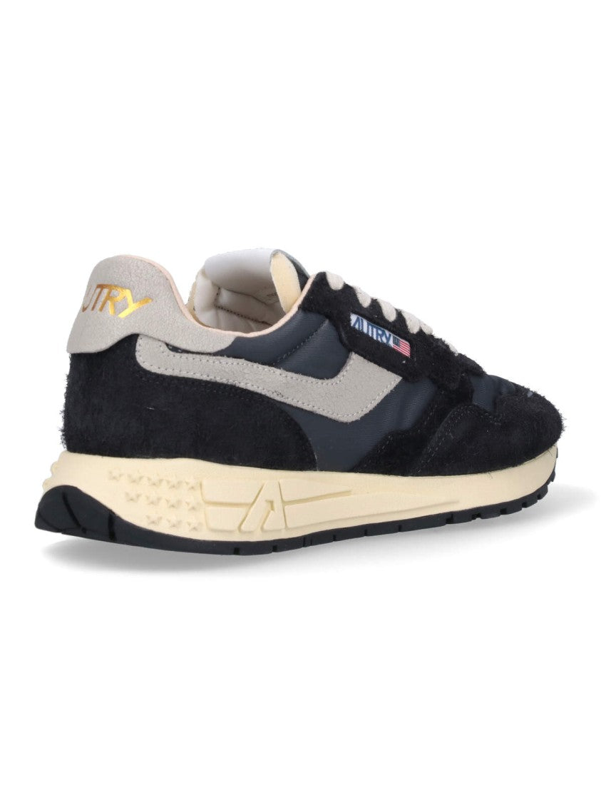 Autry Streamlined Black Sneakers With Minimalist Design