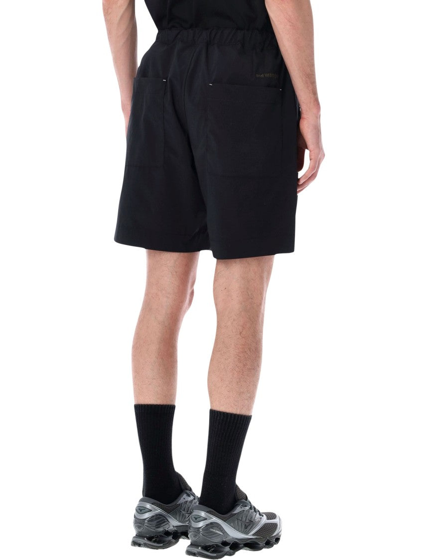 And Wander Technical Mid Thigh Shorts