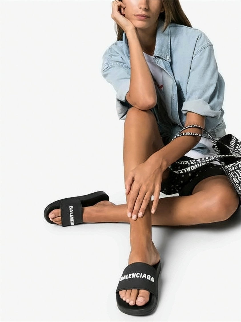 Balenciaga Contemporary Black Rubber Slide Sandals With Embossed Branding