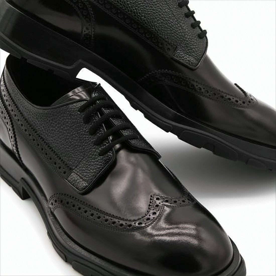 Alexander Mcqueen Leather Wingtip Loafers With Brogue Detailing