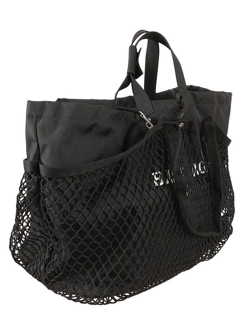 Balenciaga Spacious Black Bag With Mesh Detailing