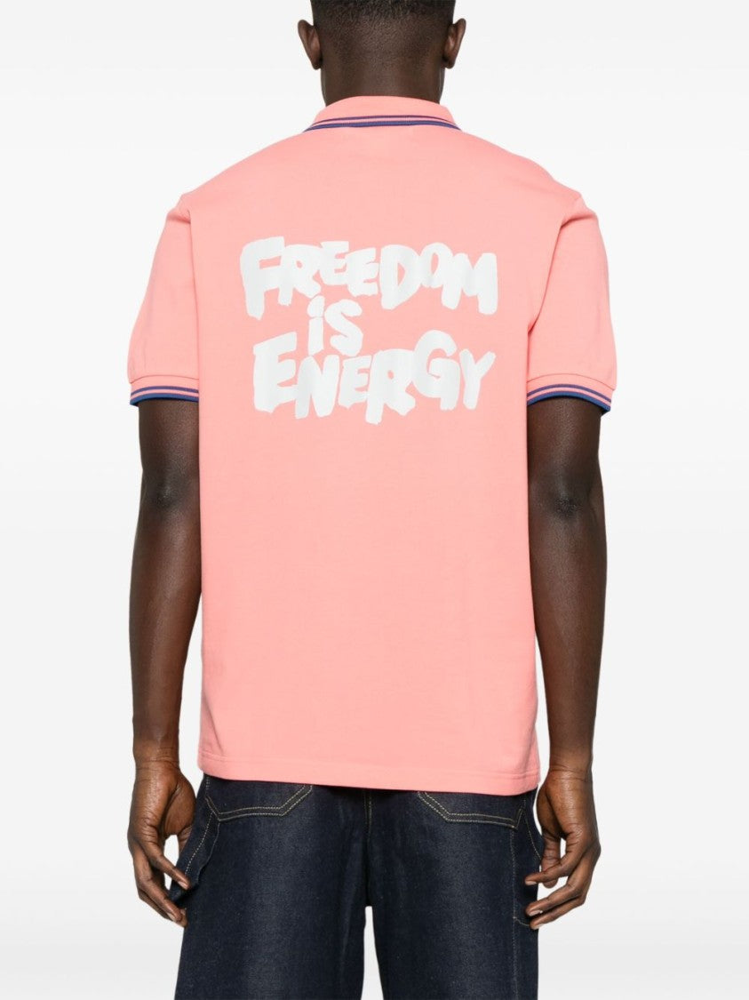 Comme Des Garçons Coral Pink Polo Shirt With Slogan Print