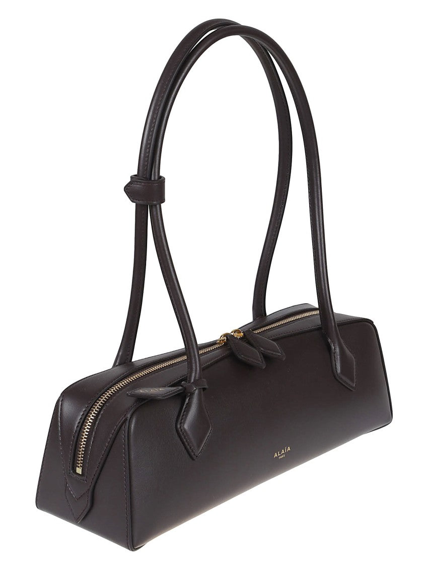 Alaïa Elongated Shoulder Bag In Smooth Calfskin Leather
