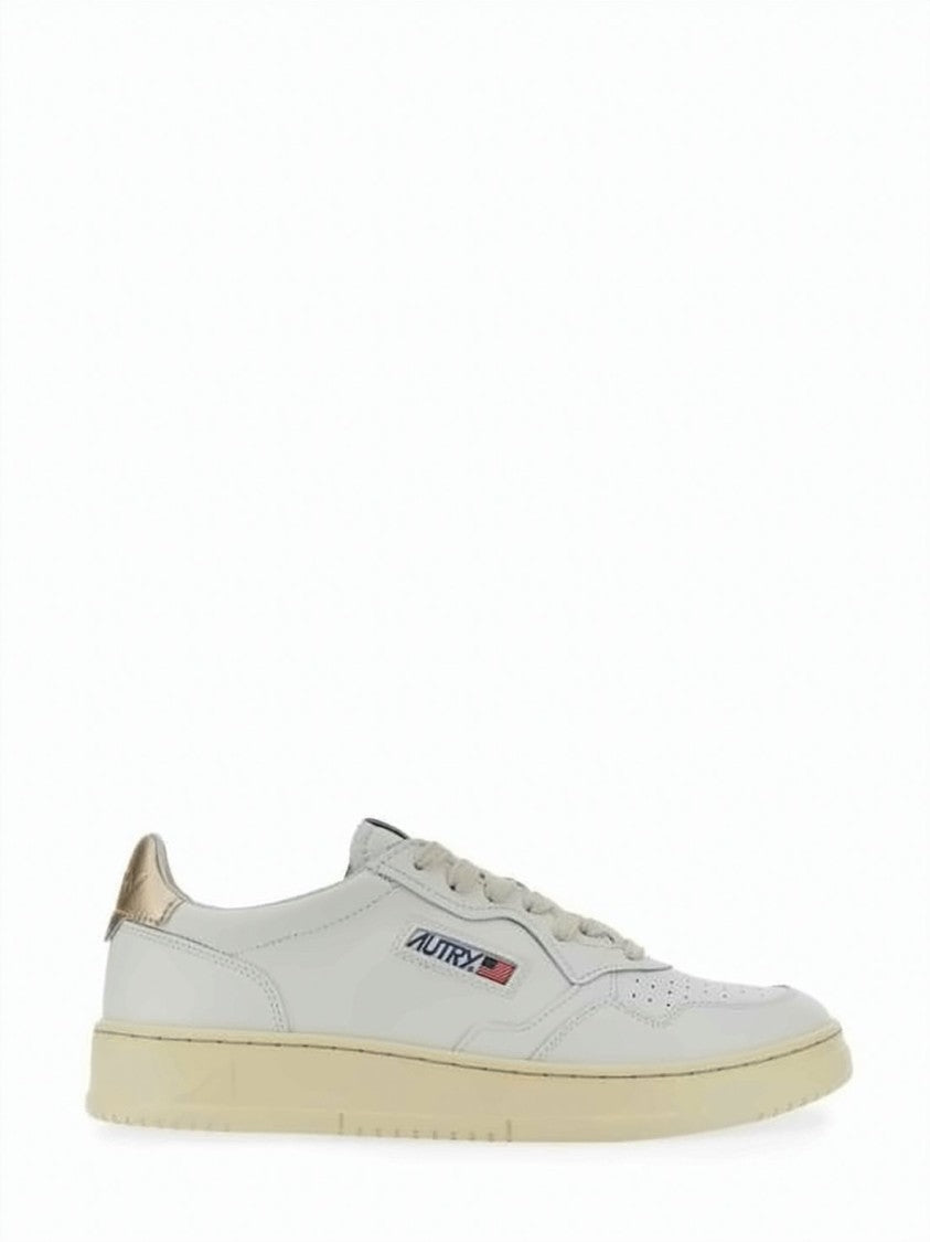 Autry Low-Top Leather Sneakers With Perforated Detailing And Metallic Accents