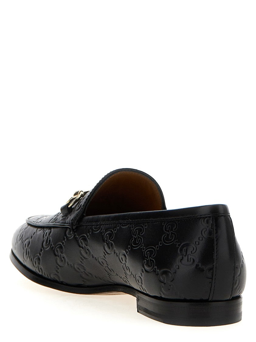 Gucci Embossed Calfskin Leather Loafers With Front Metal Clamp