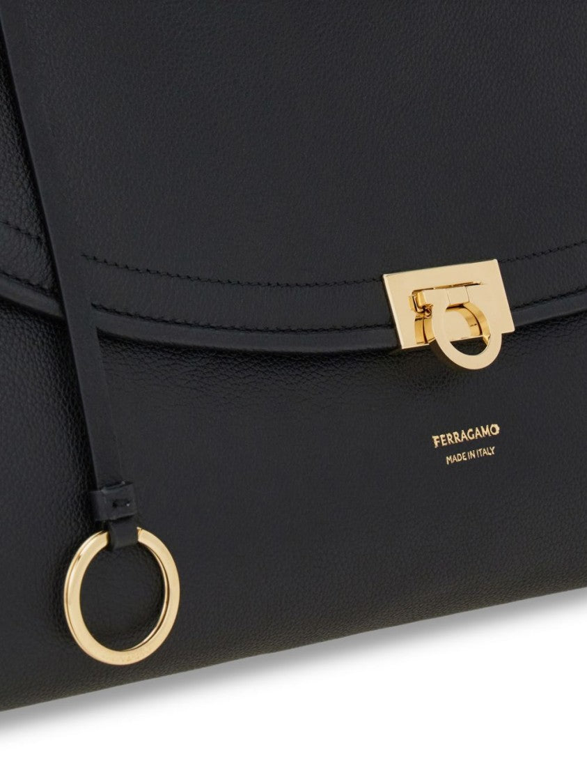 Ferragamo Elongated Gold-Tone Accent Black Calfskin Handbag