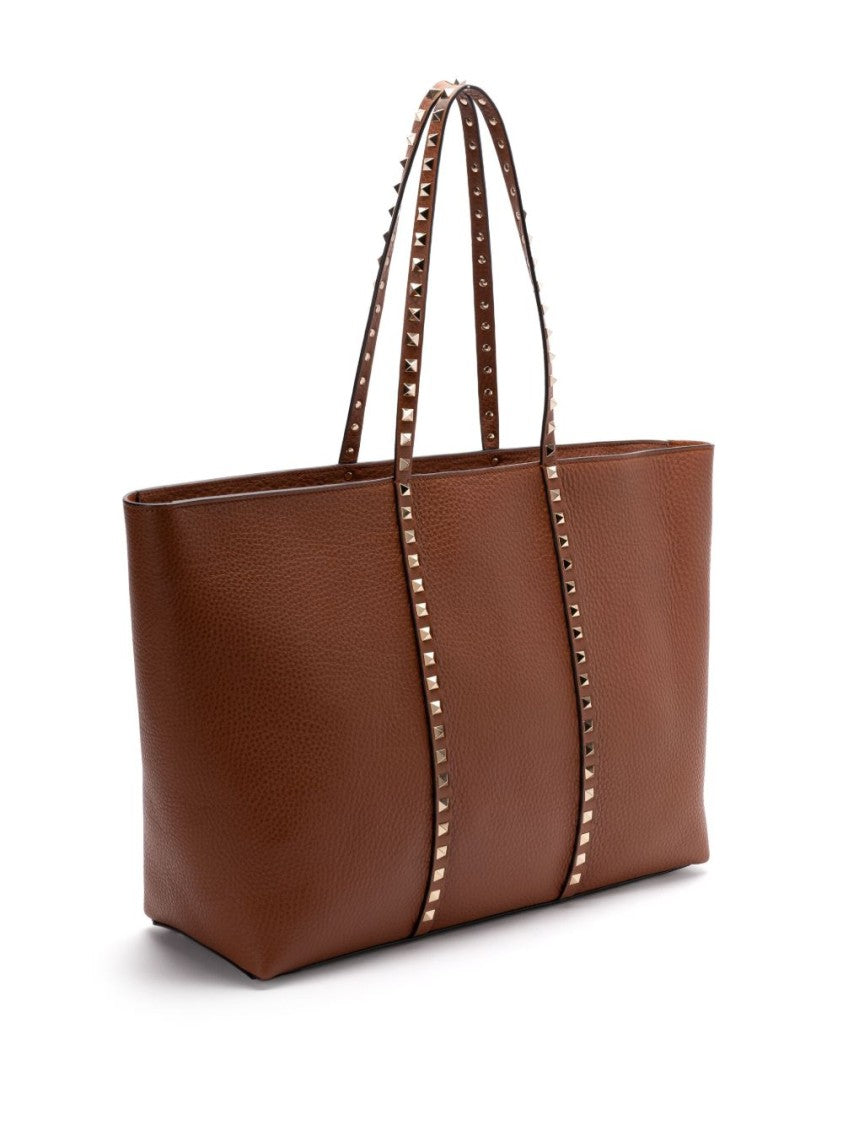 Valentino Garavani Structured Handbag With Subtle Sheen And Versatile Carrying Options