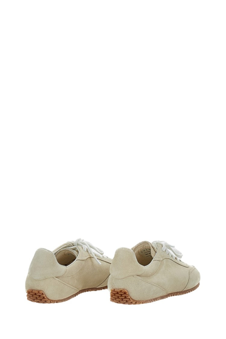 Axel Arigato Minimalist Beige Low-Profile Sneakers With Cross-Panel Design