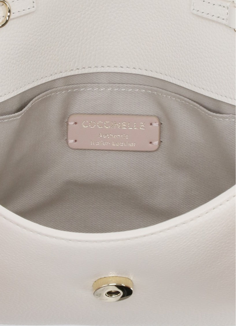 Coccinelle Ivory Leather Shoulder Bag With Adjustable Strap And Flap Closure
