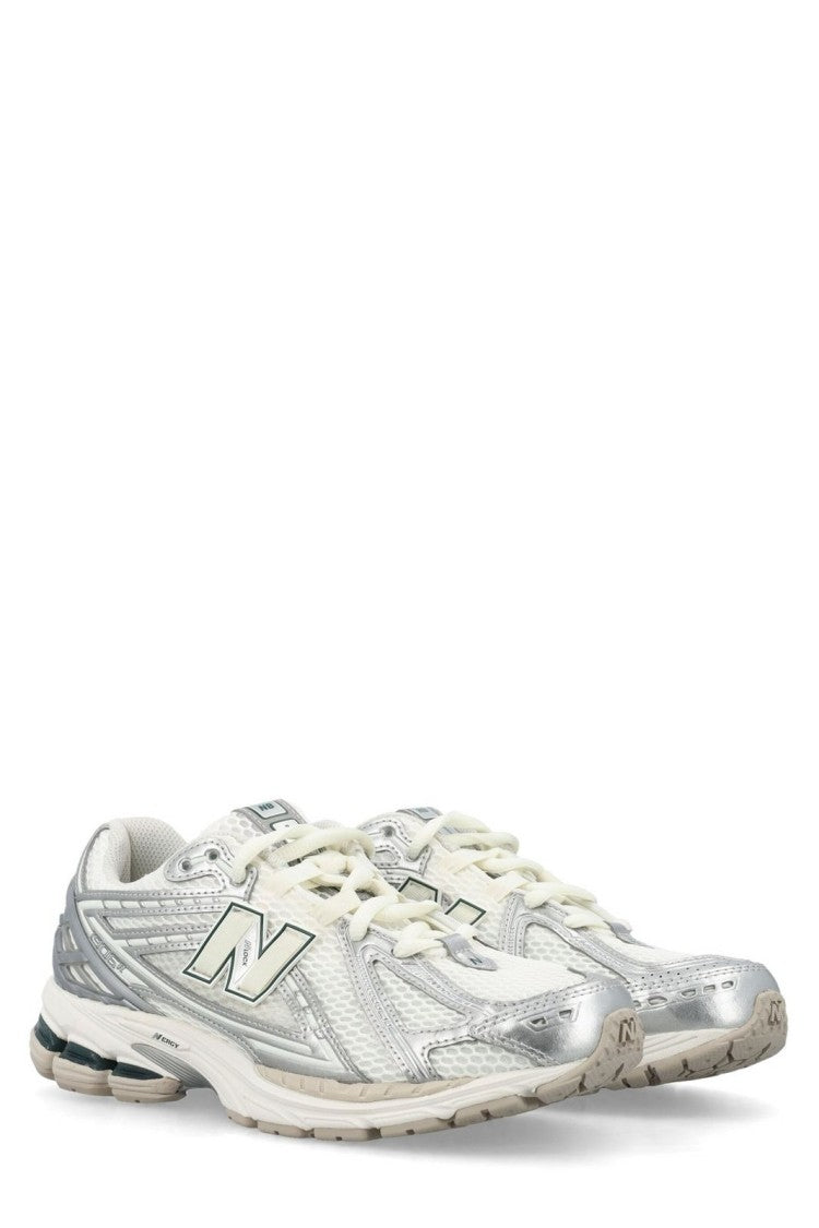 New Balance Low-Top Sneakers With Silver Accents And Cushioned Sole