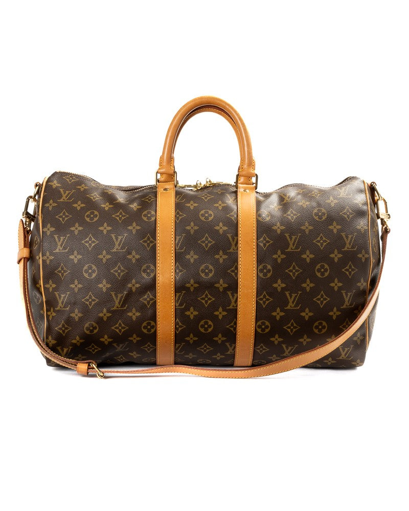 Louis Vuitton Travel Duffle Bag With Classic Monogram Pattern And Adjustable Strap