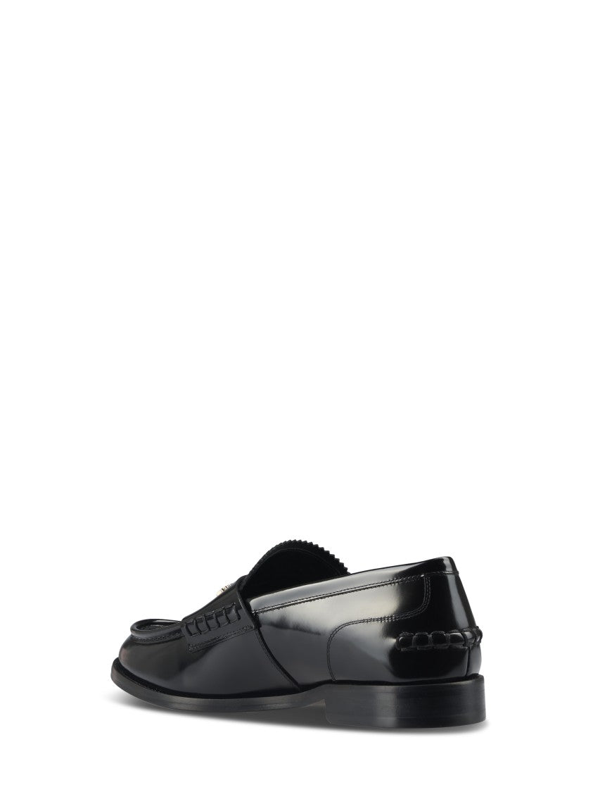 Alexander Wang Glossy Black Loafers With Decorative Strap And Elegant Silhouette