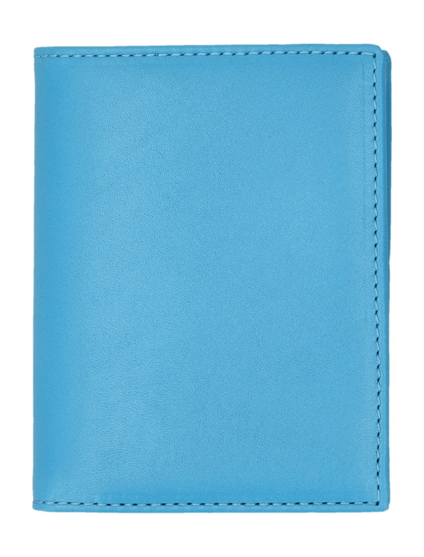 Comme Des Garçons Bifold Wallet With Vibrant Blue Exterior