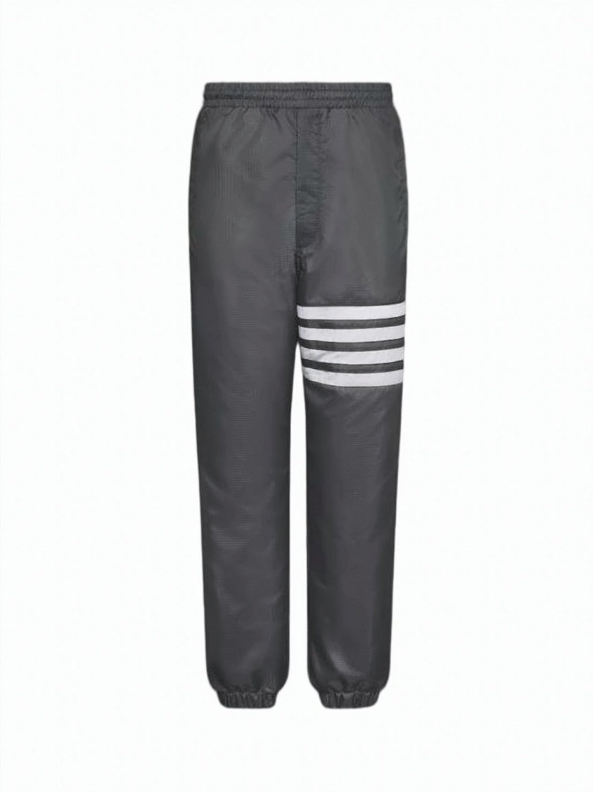 Thom Browne Shiny Ripstop Track Pants With Four Stripes
