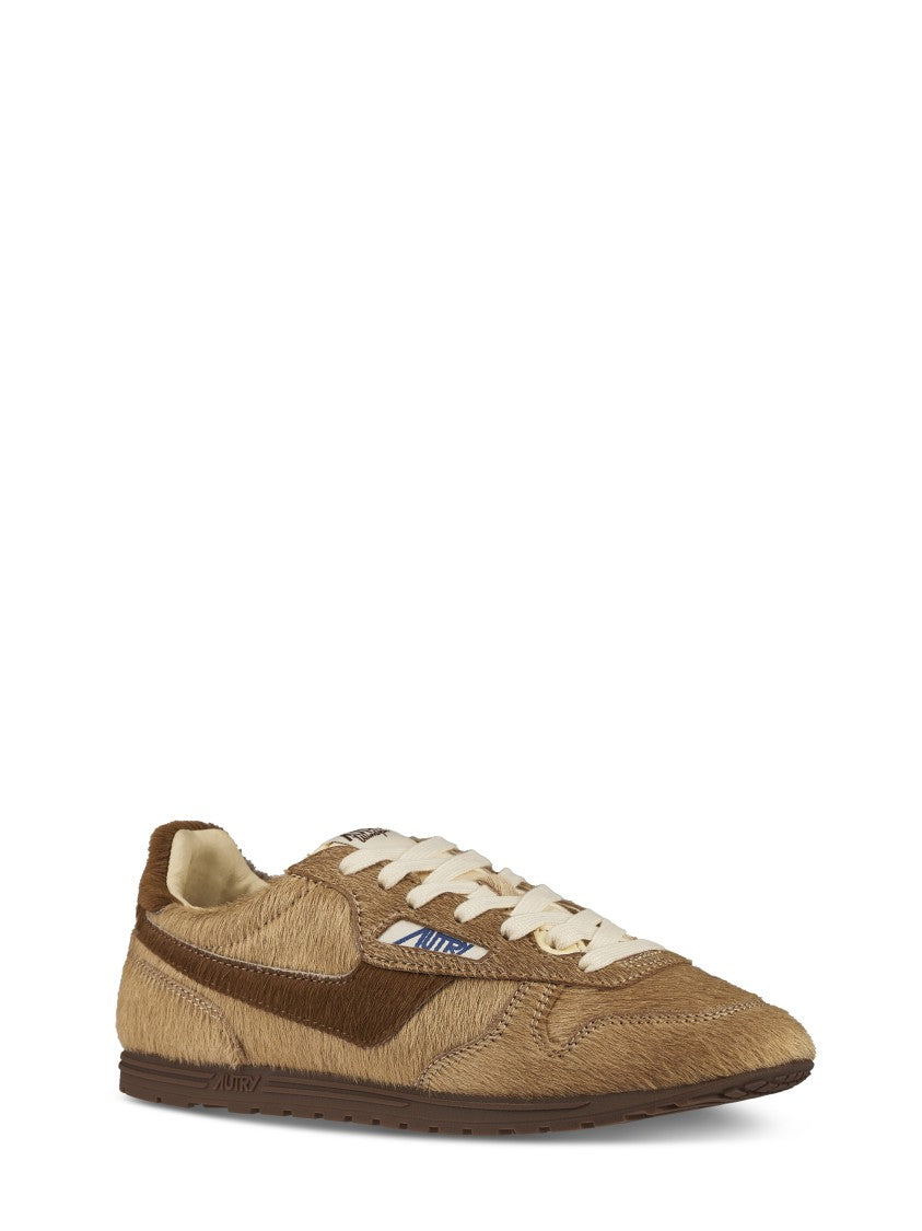 Autry Textured Brown Sneakers With Contrasting Swoosh