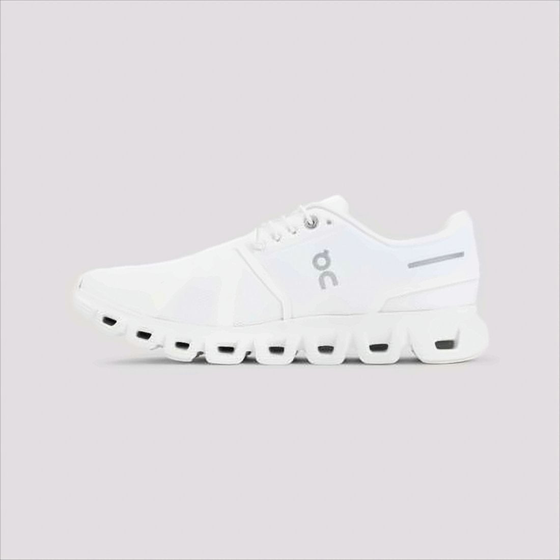 On Running Breathable White Sneakers With Segmented Cushioning