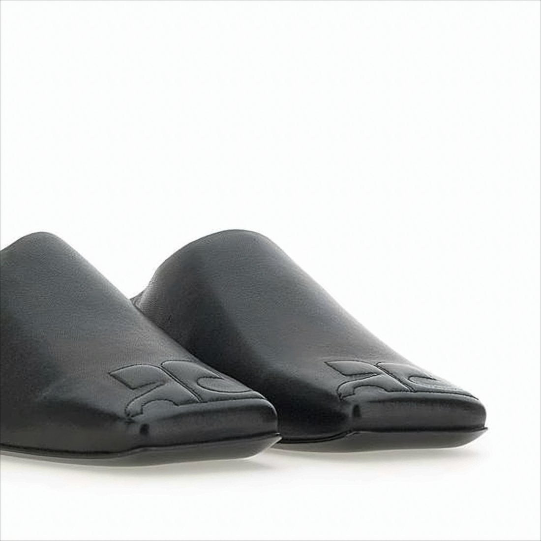 Courrèges Minimalist Black Lambskin Slip-On Mules With Embossed Detail