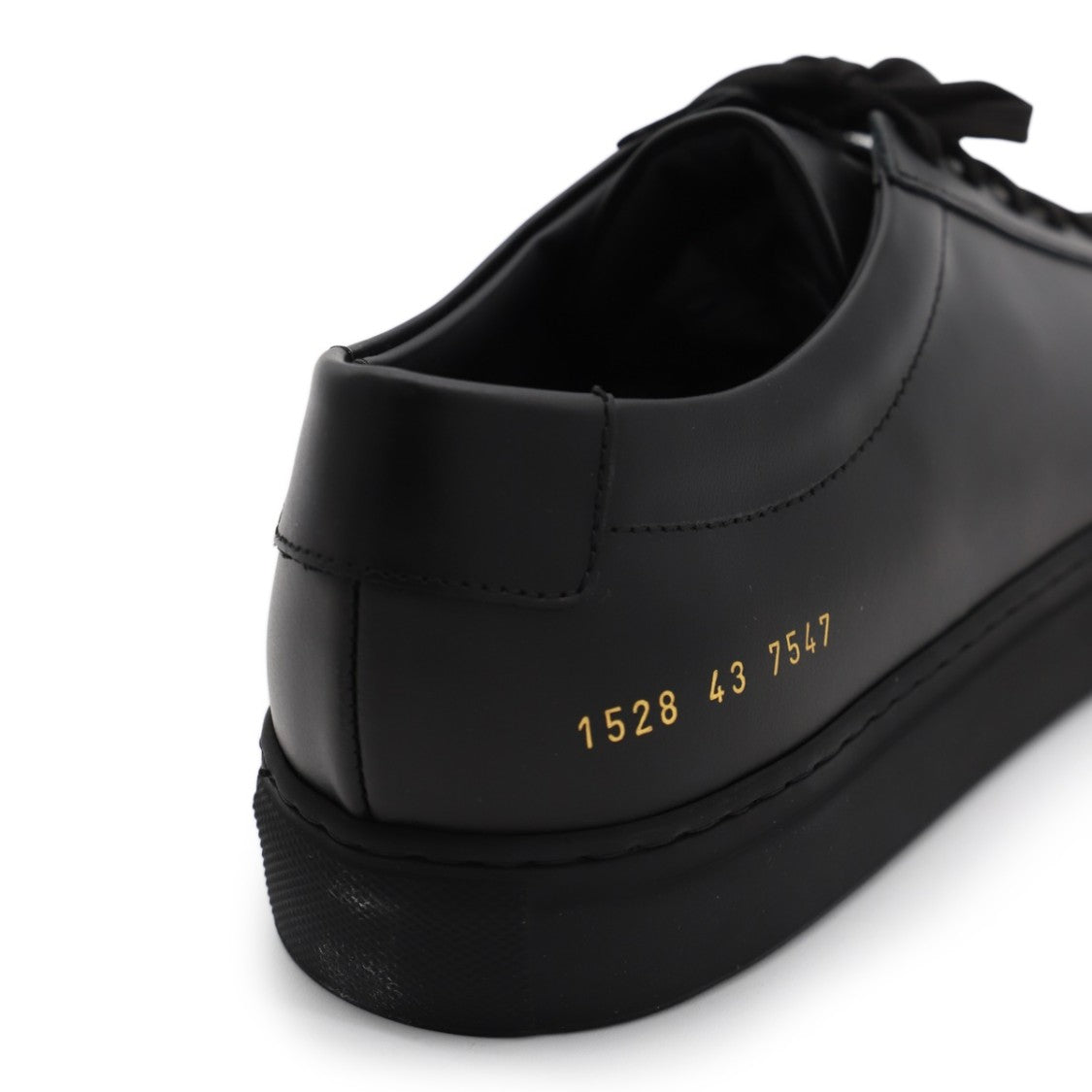 Common Projects Minimalist Black Leather Sneakers With Gold Detailing