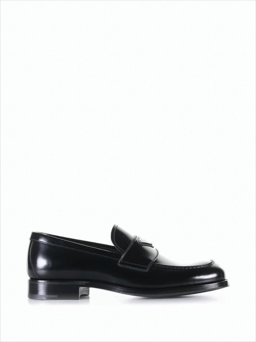 Prada Polished Black Leather Loafers With Minimalist Design