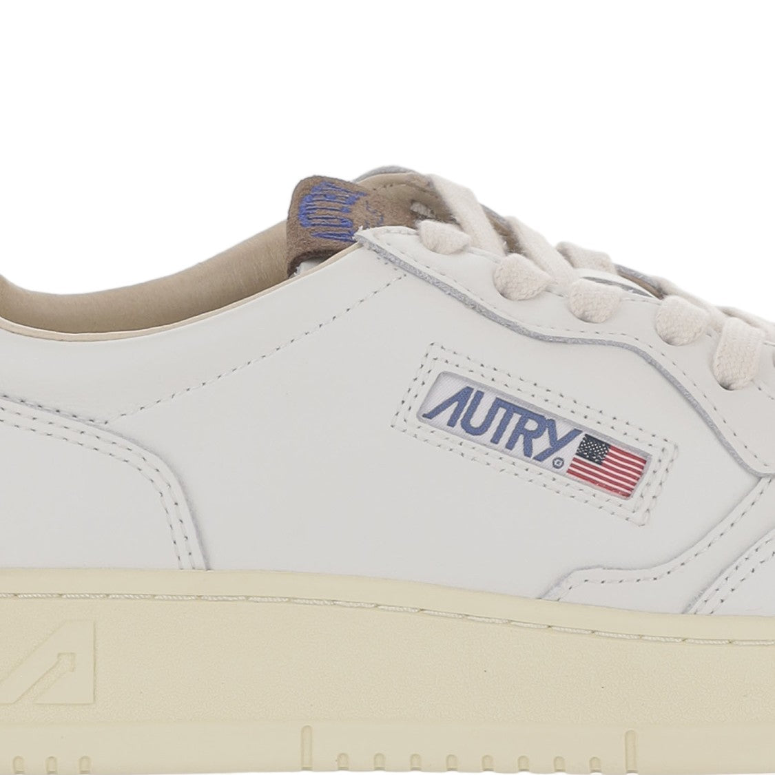 Autry Low-Top Leather Sneakers With Suede Heel Tab And Logo Details