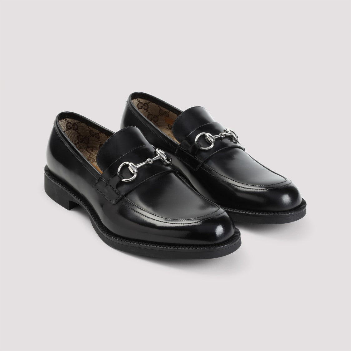 Gucci Polished Black Leather Loafers With Decorative Metal Detail