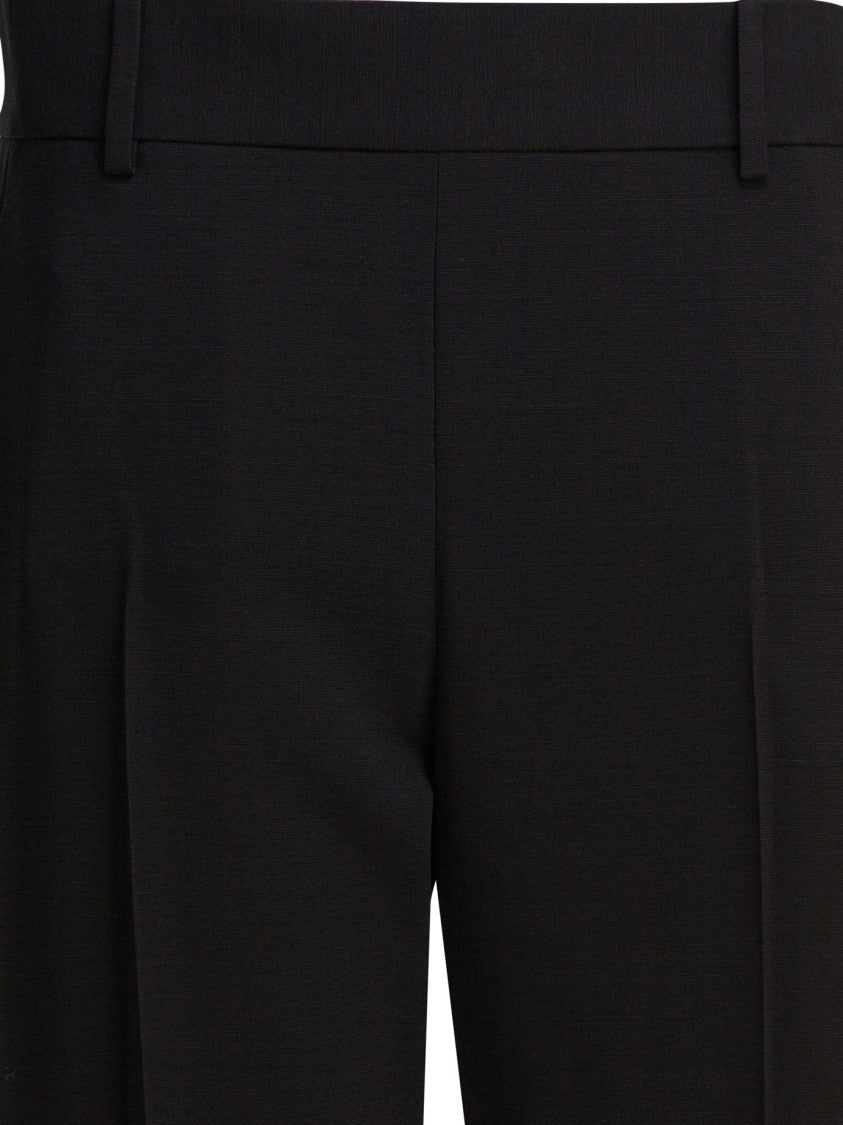 Khaite High-Waisted Trousers