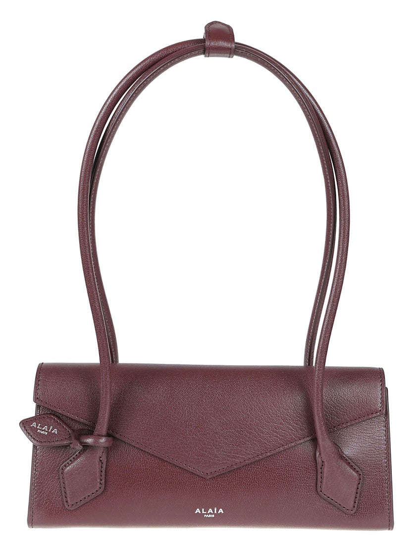 Alaïa Burgundy Smooth Leather Bag With Structured Flap Closure