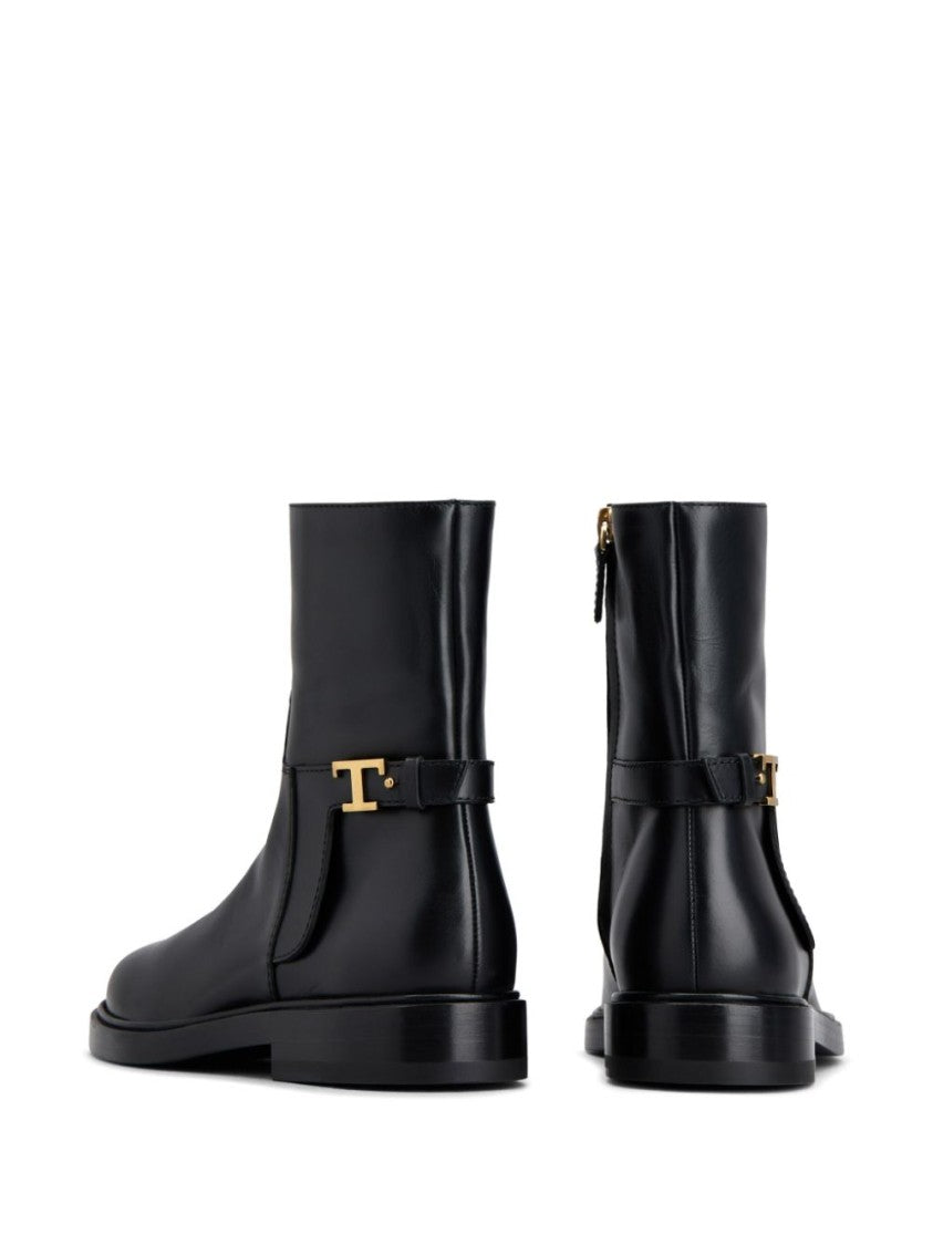 Tod's Minimalist Black Ankle Boots With Gold Accent