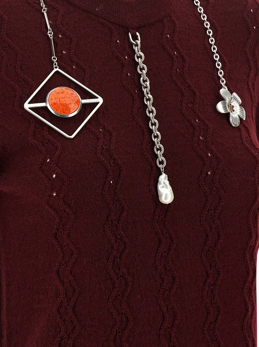 Prada Burgundy Virgin Wool Sweater With Distressed Front And Metal Charms