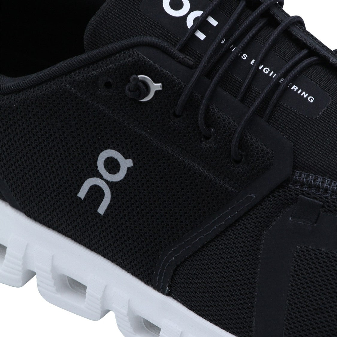On Streamlined Black Sneakers With Textured Sole