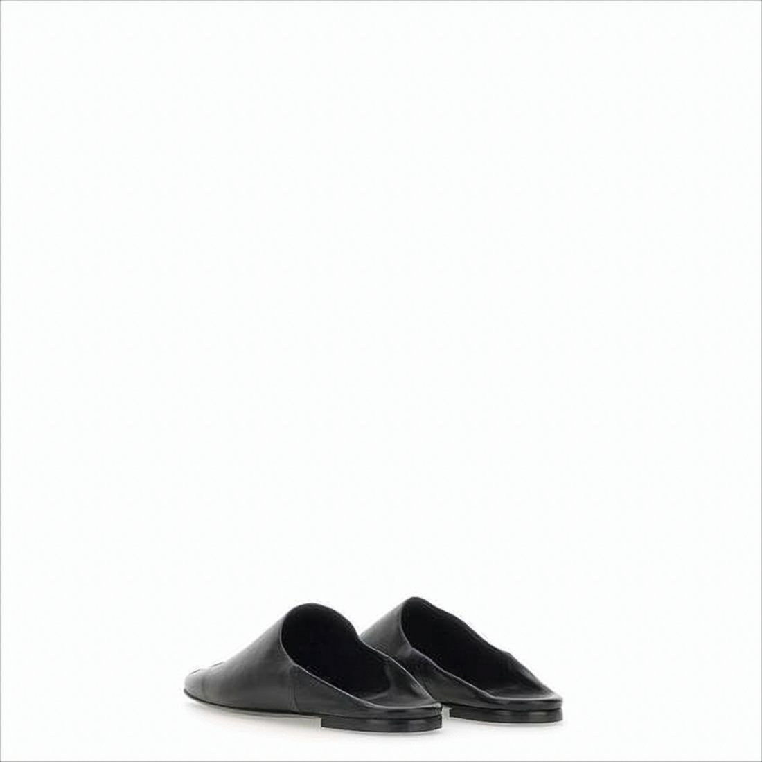Courrèges Minimalist Black Lambskin Slip-On Mules With Embossed Detail