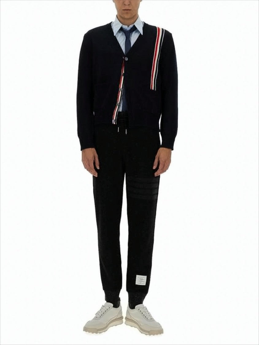 Thom Browne Tapered Jogger Pants With Ribbed Cuffs And Subtle Stripes