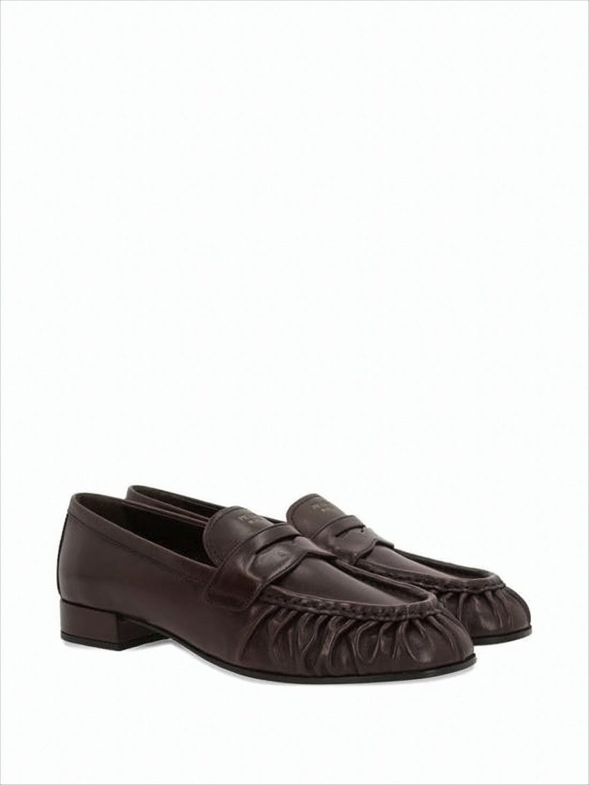 Prada Buffalo Leather Low Block Heel Loafers