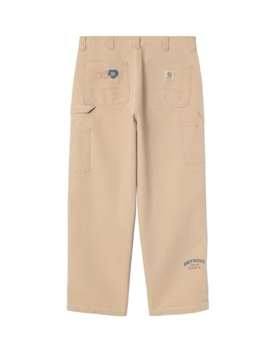 Carhartt Wip Relaxed Fit Cropped Beige Pants With Graphic Prints