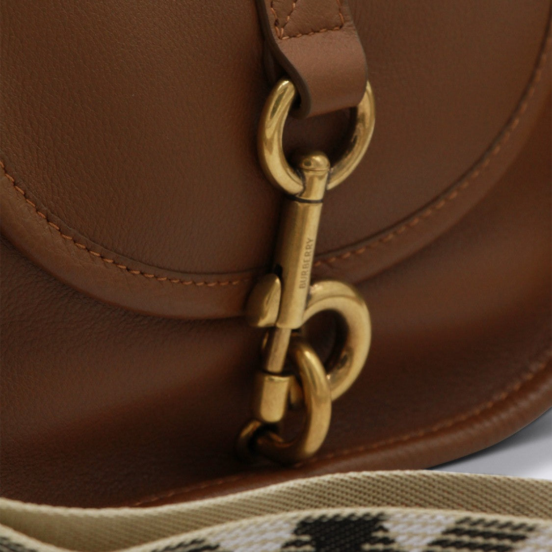 Burberry Structured Saddle Bag With Gold-Tone Clasp And Check Pattern Strap