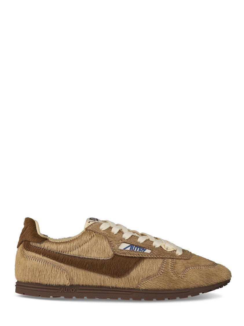 Autry Textured Brown Sneakers With Contrasting Swoosh