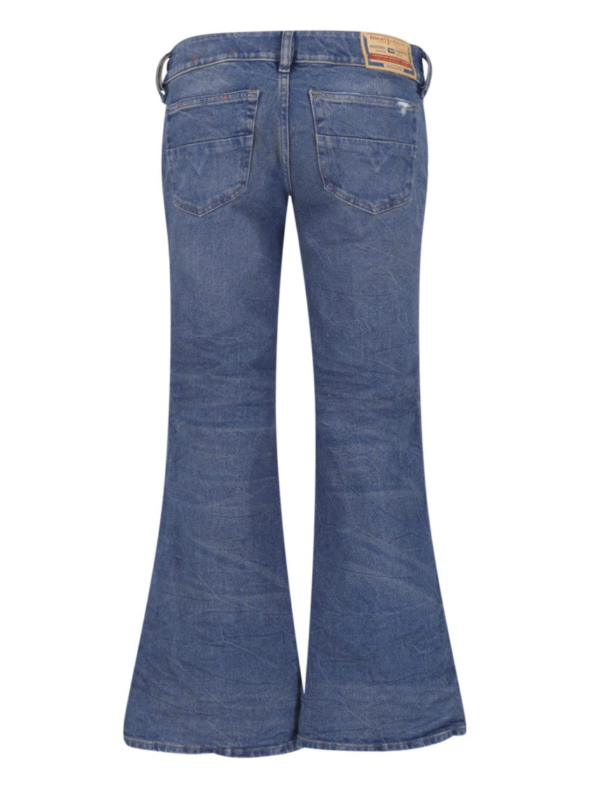 Diesel Flared Blue Wash Jeans With Vintage Distressing
