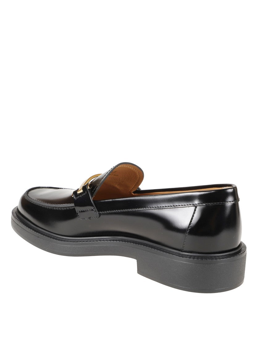 Tod's Polished Black Leather Flats With Gold-Tone Accent