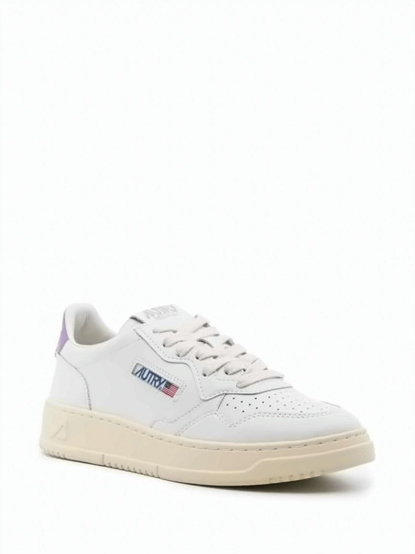 Autry Low-Top Leather Sneakers With Perforated Detailing And Logo Accent