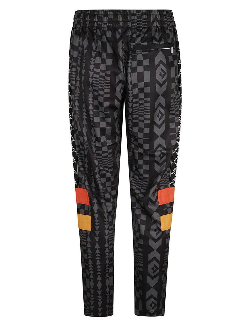 Marcelo Burlon Geometric Pattern Trousers With Tapered Legs