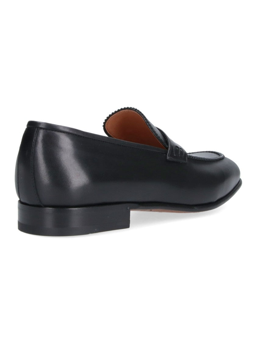 Ferragamo Black Round Toe Smooth Leather Loafers