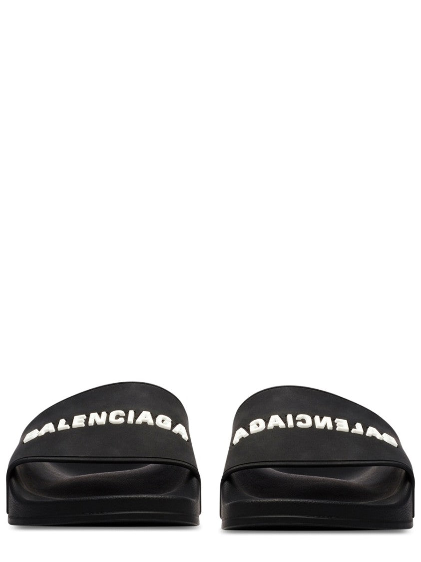 Balenciaga Contoured Black Slip-On Sandal With Bold Logo Print