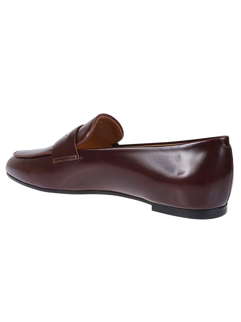 Tod's Streamlined Leather Moccasins With Refined Metal Accent